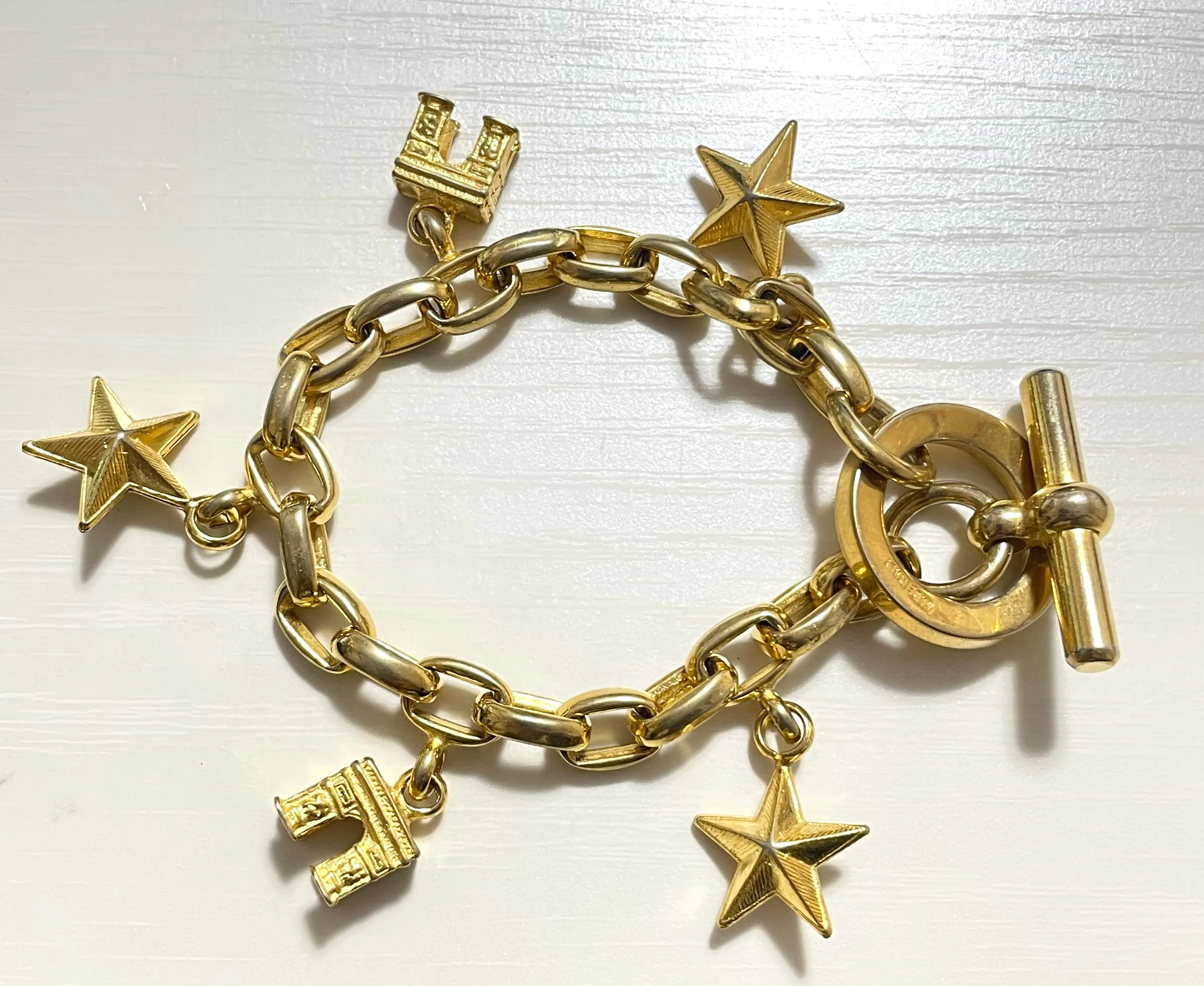 Vintage Celine chain bracelet with Triomphe and star charms. One-of-a-kind Celine jewelry. 061224ac1